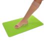 Fuß mit Stützstrumpf auf einer grünen Steve Mat Antirutschmatte